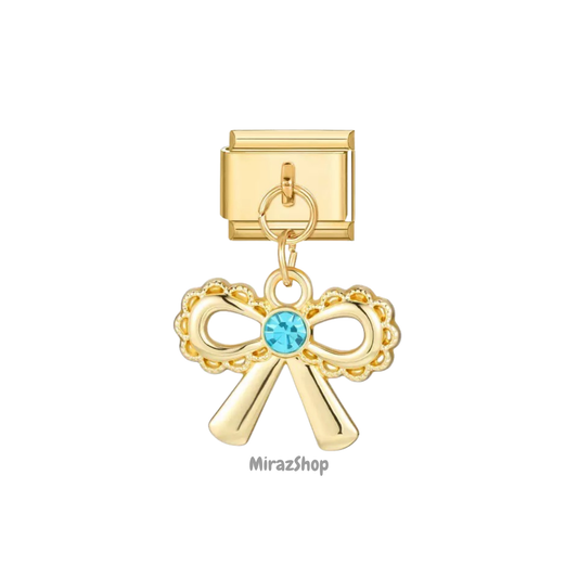 Pendentif noeud strass bleu
